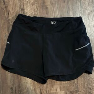 Athleta girl black record breaker shorts with teal zipper size 12
